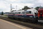 Die 1116 250-2 im Polizei-Look schiebt den Railjet 655  am 09.07.2012 in Richtung Graz Hauptbahnhof.