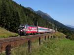 Die 1116 138 mit einem OIC am 08.09.2012 unterwegs bei Penk.