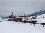 Die 1116 264 mit einem Turnuszug am 02.03.2013 unterwegs bei Fieberbrunn.