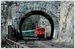 1141 024 mit dem Erlebniszug Zauberberge als EZ 1968 von Mrzzuschlag nach Wiener Neustadt vor der Durchfahrt des 13,55 Meter langen Krausel-Tunnel kurz vor Breitenstein am Semmering.