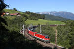 Die schöne im Toppzustand befindliche 1144.213 leistet der 1116.270 am G-49415 kurz vor Eichberg,am Abfaltersbachgraben-Viadukt vorspann.