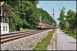 1144 249 und eine Schwestermaschine bringen bei Kiefersfelden einen Kalkzug nach Kirchbichel i.Tirol.