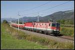 1144 079 + 1144 009 mit Güterzug bei Niklasdorf am 13.09.2019.