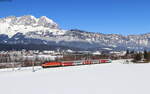 1144 092 mit dem REX 1510 (Schwarzach-St.Veit – Wörgl Hbf) bei Oberndorf in Tirol 9.2.22