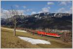 1144 245 als Vorspann vor einer 1X16 mit ihrem Gterzug ber den Semmering, aufgenommen am 25.2.2012 auf der Apfel Wiese.