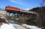 BB 1144 233-4 schiebt OIC 515 Innsbruck - Graz, Ennstalbahn KBS 250 Bischofshofen - Selzthal, fotograiert auf der Salzachbrcke in Bischofshofen am 07.03.2012