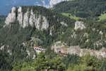 1144 217 mit 1116 xxx zogen einen Schotterzug ber die Krausel Klause kurz vor dem Polleros Tunnel Bergwrts richtung Sden; am 08.09.2012