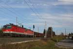 BB 1144 210 und 1144 019 mit einem Erzzug gebildet aus Fals-z der slowenischen SZ bei der Ausfahrt aus Faak am See Richtung Villach Westbahnhof am 25.11.2012