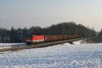 1144 212 mit einem Gterzug am 04.12.2010 bei Hilperting.