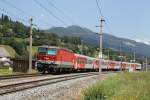 1144 090 mit REX 1506 Salzburg Hauptbahnhof-Wrgl Hauptbahnhof bei Brixen im Thale am 22-7-2013.