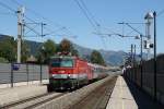 1144 205 mit OIC 514 Bischofshofen-Innsbruck Hauptbahnhof auf Bahnhof Brixen im Thale am 2-8-2013.