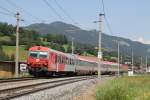 80-73 080-8 und 1144 070 mit OIC 514 Bischofshofen-Innsbruck Hauptbahnhof bei Brixen im Thale am 24-7-2013.