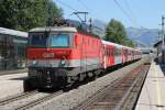 1144 036 mit REX 1506 Salzburg Hauptbahnhof-Wrgl Hauptbahnhof auf Bahnhof Brixen im Thale am 2-8-2013.