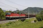 1144 112 + 1144 100 mit Güterzug in Bruck/Mur Übelstein am 22.05.2014.