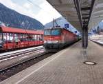 1144 032 + 1116 XXX mit einem Güterzug, auf der Fahrt in Richtung Villach.