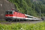 1144 126 mit EC164 beim Galgenbergtunnel bei St.Michael am 30.06.2016.