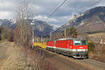 Die erst im November hauptausgebesserte 1144.266 fährt mit ihrer Schwester 251 am G-54627 bei Payerbach/R.