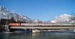 Eine 1216 mit dem EC 87  DB-ÖBB EuroCity  (München Hbf - Venezia Santa Lucia) in Brixlegg bei der Überquerung des Inns, 16.01.2019.