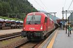 Ausfahrt am 03.07.2018 von 1216 011 (E 190 011) mit ihrem EC 80 (Verona P. N. - Rosenheim) aus dem Bahnhof von Brenner in Richtung Innsbruck. Wegen Bauarbeiten zwischen Rosenheim und München endete der Zug bereits im Bahnhof von Roseheim.