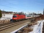 Die 1216 023 mit einem Brenner EC am 06.02.2011 unterwegs bei Vogl.