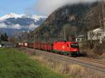 Die 1216 003 mit einem Stahlzug am 16.11.2013 unterwegs bei Campo di Trens.