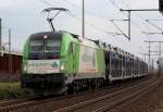 1216 954  Hdlmayr  mit Dacia Autozug in Porz Wahn am 29.03.2012