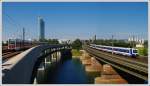 Panoramaaufnahme, bestehend aus 3 Bildern, aufgenommen von der U6 Haltestelle  Neue Donau  am 14.6.2009 mit dem Wiener Millenium Tower im Hintergrund.