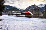 4024 122-6  Sonnenstadt Lienz  fährt als S1 4225 (Friesach - Lienz) kurz vor der Haltestelle Berg im Drautal vorüber.