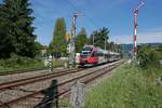 Auf der Fahrt von Feldkirch nach Lindau passiert 4024 081-4 am 11.08.2018 als REX 5584 die Einfahrsignale von Lindau-Reutin.