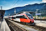 4024 xxx und 4024 122-6 halten als REX 1738 (Lienz - Villach Hbf - St. Veit a. d. Glan), im Bahnhof Spittal-Millstättersee.
Aufgenommen am 26.7.2018.