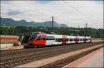 Der saubere 4024 138 verlsst als R 5111 den Bahnhof Kundl Richtung Innsbruck Hbf.