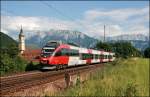 4024 073 ist vor dem Kaisergebirge als RB 5122 von Telfs-Pfaffenhofen nach Rosenheim unterwegs. Aufgenommen beim Kloster Raisach am 05.07.2008.