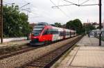 4024 100 fhrt am 27.05.2009 als S45 von Wien Htteldorf nach Wien Handelskai, hier bei der Einfahrt in Wien Gersthof.