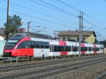 4024 107-7(BahnStore Hallein) verlsst mit Zugleistung R3012  Bhf.