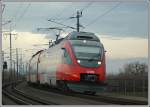 Triebwagen der BR 4024 von Wien Sd nach Wien Hausfeldstrasse am 9.12.2006 nach der Querung der Donau in der Wiener Lobau.