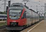 10.7.2013
4124-005 ist als S60 am Weg von Bruck an der Leitha nach Rekawinkel. Hier zu sehen im Bahnhof Wien-Htteldorf. Im Hintergrund ein 4020er als S45 nach Wien-Handelskai.