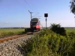 Ein 4124 Triebwagen kurz nach Deutschkreutz erreicht in Krze die ungarische Grenze auf der Fahrt nach Wien Meidling, August 2010