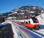 4746 038 als REX 1519 (Wörgl Hbf - Straßwalchen) bei Fieberbrunn, 07.02.2020.