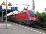 1116 075-1(EM-Lok  Schweiz ) mit EC 112 am 28.04.09 bei der einfahrt in Bensheim.