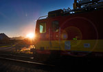 X 552 003-6 steht beim Sonnenuntergang im Bahnhof Greifenburg-Weißensee.
Aufgenommen am 23.8.2016.