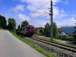 Salzkammergut 2009 - Kurz vor dem Bahnhof Altmnster ist am 31.05.2009 der R 3414 nach Obertraun unterwegs.