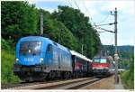 Unverhofft kommt oft: Kyoto 1016.23 begegnet mit dem Orient Express (D13260) dem REX1629 bei Tullnerbach-Pressbaum, 26.6.2010.