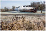 498.04 dampft mit einem Adventzug von Steyr nach Grünburg, durch das winterliche Steyrtal.