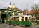 Tw.234 vor der Halle des Tramwaymuseums,im Hintergrund die Basilika Mariatrost.(18.11.2012)