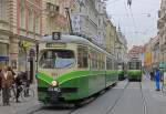 12.10.2012    Herbstlicher Tag in Graz: Drei Zge der Grn-Weien Straenbahn in der Herrengasse zwischen Hauptplatz und Jakominiplatz.