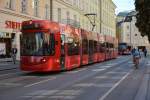 Diese Straßenbahn von Bombardier  354  fährt am 12.10.2015 durch Innsbruck.