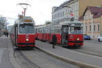Wien Wiener Linien SL 31 (E2 4064 (SGP 1986)) / SL 30 (E1 4844 (SGP 1975) + c4 1312 (Bombardier-Rotax, vorm. Lohnerwerke, 1974)) XXI, Floridsdorf, Stammersdorf, Bahnhofplatz am 29. November 2019. 