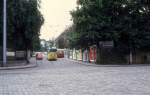 Wien WVB SL 38 (E1 4642) Grinzing, Strassergasse im Juli 1977. - Der E1 4642 warb vom Jahre 1975 bis 1982 mit einer Totalwerbung fr das Mineralwasser  Rmerquelle .