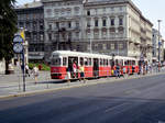 Wien WVB im August 1994: Ein Zug der SL 49 (c3 1124 + E1) hält an der Haltestelle Volkstheater in der Burggasse (im 7.