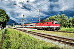 1144 234-2 fährt mit dem D 735 (Villach Hbf - Lienz), aus dem Bahnhof Greifenburg-Weißensee aus.